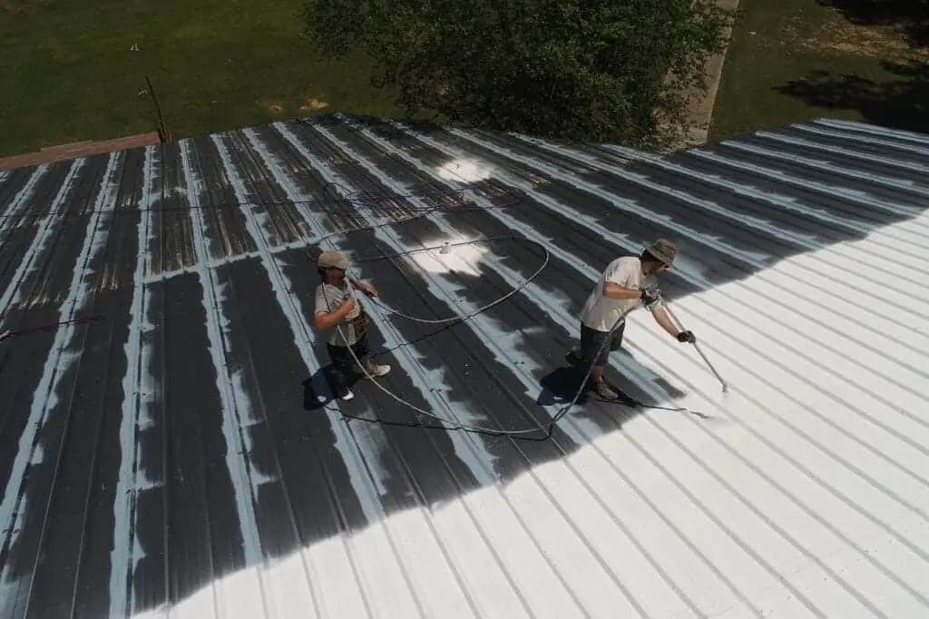 Professional roof coating being applied by Northway Roofing in Santa Fe, NM
